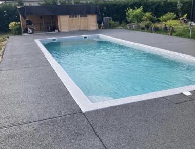 Terrasse de piscine en béton Hydromedia